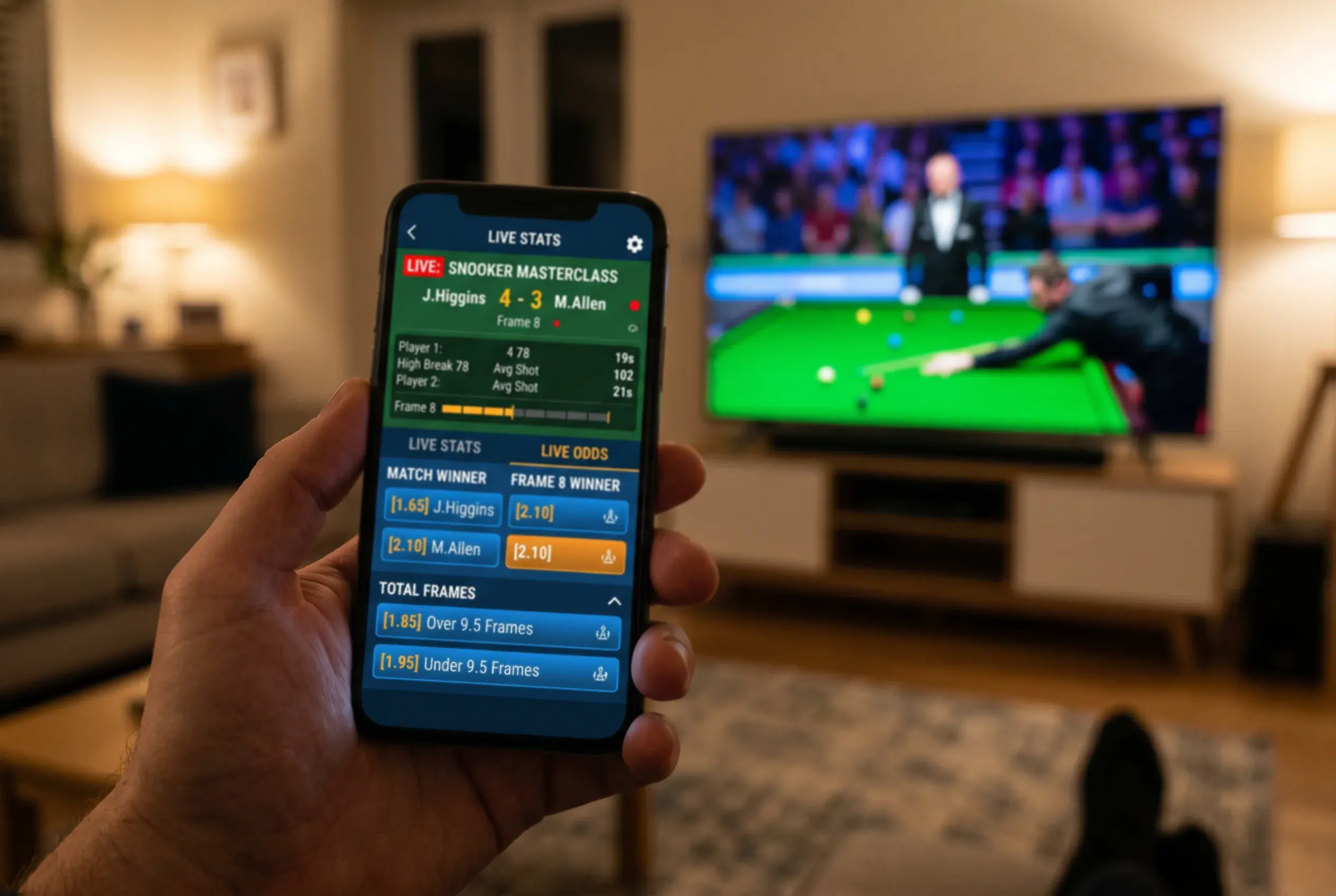 Snooker Wetten App — Smartphone mit Live-Wetten-Interface neben laufendem Snooker-Match